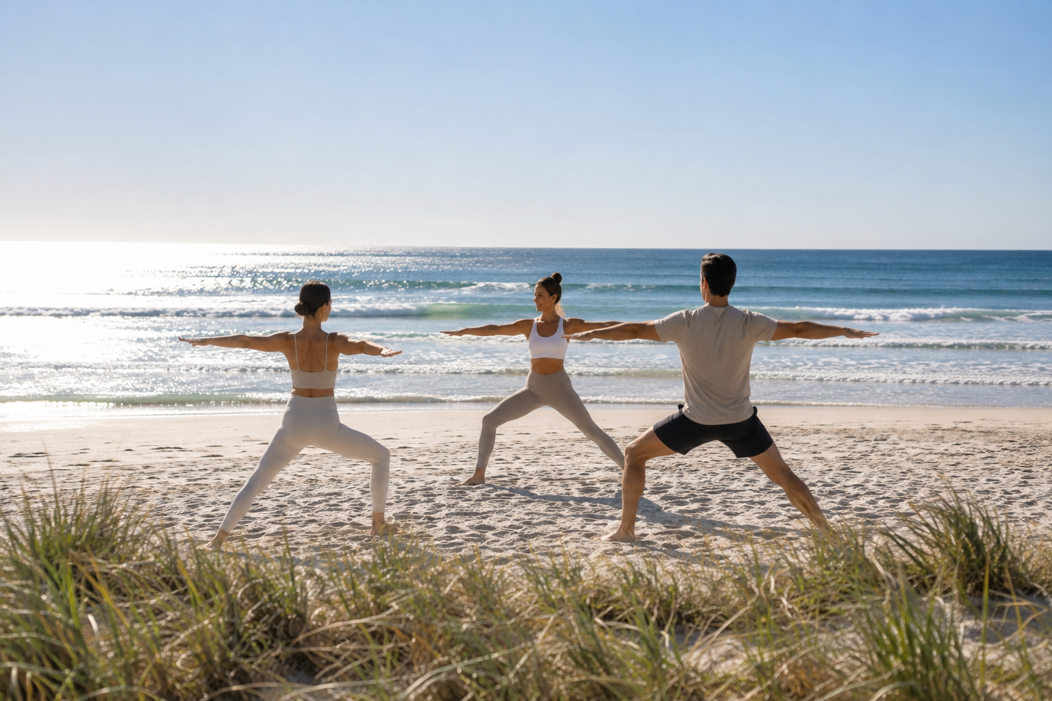 Group beach yoga class on the Gold Coast